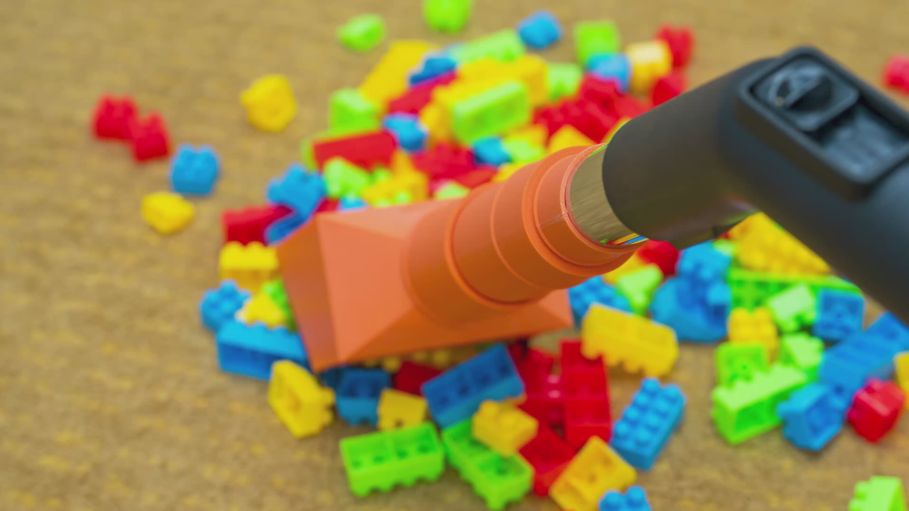Load video: Tired of stepping on scattered toy blocks? BlockSwiper is the smart vacuum attachment that makes cleanup fast, safe, and fun. Compatible with most vacuums. 